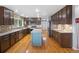 Contemporary kitchen with stainless steel appliances, granite counters, and a convenient island at 3237 W 113Th Ave, Westminster, CO 80031