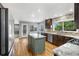 Modern kitchen boasting stainless steel appliances, granite countertops, and a functional center island at 3237 W 113Th Ave, Westminster, CO 80031
