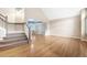 Bright living room featuring hardwood floors and a seamless flow into the dining area at 3237 W 113Th Ave, Westminster, CO 80031