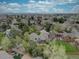 Stunning aerial view of the property showcasing the lush landscaping and proximity to amenities at 13959 W Cedar Pl, Golden, CO 80401