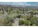Expansive aerial view of the home and surrounding neighborhood with mountain backdrop at 13959 W Cedar Pl, Golden, CO 80401