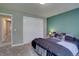 Bedroom with closet, carpeted floor, and neutral decor, providing a comfortable living space at 13959 W Cedar Pl, Golden, CO 80401