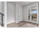 Bright entryway featuring modern decor and direct access to the outside patio at 3580 W 62Nd Pl, Denver, CO 80221
