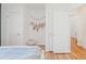 Bright bedroom with hardwood floors and ample closet space at 1101 Bellaire St # 204, Denver, CO 80220