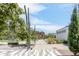 Landscaped walkway with Culinary Dropout in background at 1101 Bellaire St # 204, Denver, CO 80220