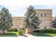 Well-maintained apartment building with landscaping at 1101 Bellaire St # 204, Denver, CO 80220