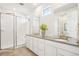 Elegant bathroom with double vanity, a large shower and modern fixtures at 15604 W Girard Ave, Morrison, CO 80465