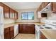 Well-maintained kitchen with ample counter space and modern appliances, perfect for cooking and entertaining at 3518 S Depew St # 102, Lakewood, CO 80235