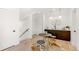Finished basement area with a bar, modern lighting, and stylish accents at 4520 W Moncrieff Pl, Denver, CO 80212