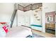 Unique bedroom with a loft, ladder, and cat climbing feature at 4520 W Moncrieff Pl, Denver, CO 80212