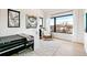 Bright bedroom features a modern window, stylish decor, and comfortable furnishings at 4520 W Moncrieff Pl, Denver, CO 80212