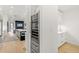 Gourmet kitchen featuring a built-in wine fridge and seamless access to a well appointed butler's pantry at 4520 W Moncrieff Pl, Denver, CO 80212