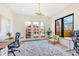 Office space with large windows and stylish furniture and fixtures at 4520 W Moncrieff Pl, Denver, CO 80212