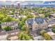 Scenic aerial view of property with cityscape, highlighting lush trees at 1140 Columbine St # 106, Denver, CO 80206