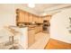 The kitchen features stainless steel appliances and a breakfast bar at 1140 Columbine St # 106, Denver, CO 80206