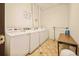 Bright laundry room with clean, well-maintained machines at 1140 Columbine St # 106, Denver, CO 80206