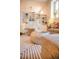 Comfortable living room with custom shelving, modern décor, and inviting seating arrangement at 1140 Columbine St # 106, Denver, CO 80206
