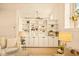 Bright living room featuring custom built-ins and neutral tones at 1140 Columbine St # 106, Denver, CO 80206