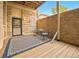 Cozy outdoor patio space with seating area and brick accents at 1140 Columbine St # 106, Denver, CO 80206