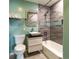 Stylish bathroom featuring a soaking tub, modern vanity, and unique color scheme at 3400 S Ivy Way, Denver, CO 80222
