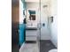 Modern bathroom with glass shower, vessel sink, and stylish tile work at 3400 S Ivy Way, Denver, CO 80222