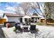 Beautiful patio setup with outdoor furniture, creating an inviting space for entertaining at 3400 S Ivy Way, Denver, CO 80222