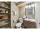 The stylish bathroom features a modern vanity, sleek fixtures, and ample storage space at 75 N Emerson St # 104, Denver, CO 80218