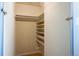 Walk-in closet with built-in shelving for maximum storage at 75 N Emerson St # 104, Denver, CO 80218