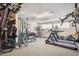 Well-equipped fitness room with treadmill, elliptical, and weight training equipment at 75 N Emerson St # 104, Denver, CO 80218