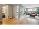 The bright living room boasts beautiful wood floors and a cozy seating area at 75 N Emerson St # 104, Denver, CO 80218