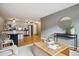 Bright living room with hardwood floors and view of the updated kitchen at 75 N Emerson St # 104, Denver, CO 80218