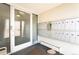 Condo lobby entrance with mailboxes and glass doors allowing natural light at 75 N Emerson St # 104, Denver, CO 80218