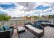 Modern rooftop patio providing a stylish retreat with comfortable seating and lighting at 75 N Emerson St # 104, Denver, CO 80218