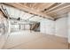 Unfinished basement space with exposed ceiling, offering a blank canvas for customization and ample storage at 1871 Grayside Cir, Castle Rock, CO 80109