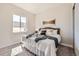 Bright bedroom with modern carpeting, decor, large window, and natural light at 1871 Grayside Cir, Castle Rock, CO 80109