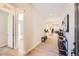 Open hallway with wood floors, leading to bedroom and living area at 1871 Grayside Cir, Castle Rock, CO 80109