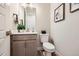 Contemporary powder room with modern fixtures, stylish decor, and natural accents at 1871 Grayside Cir, Castle Rock, CO 80109
