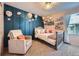 Beautiful bedroom with unique decorations and carpet flooring at 5280 Raritan Way, Denver, CO 80221