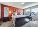 Comfortable bedroom with bright natural light and carpet flooring at 5280 Raritan Way, Denver, CO 80221