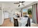 Dining area with tile floors, a ceiling fan, and sliding glass doors at 4146 S Mobile Cir # A, Aurora, CO 80013
