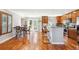 Open-concept kitchen and dining area with hardwood floors, stainless steel appliances and ample counter space at 9066 Apache Plume Dr # E, Parker, CO 80134