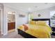 Main bedroom showcases an ensuite bathroom and decorative accents at 9066 Apache Plume Dr # E, Parker, CO 80134