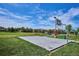 Community area offering a basketball court, playground, and green space, perfect for outdoor recreation at 9066 Apache Plume Dr # E, Parker, CO 80134