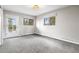 Bright bedroom with neutral walls, carpet and a door leading to a private balcony at 11608 Apache Trl, Conifer, CO 80433