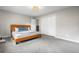 Bright bedroom featuring neutral walls, carpet floors, and a large closet, offering a serene retreat at 11608 Apache Trl, Conifer, CO 80433