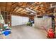 Spacious two-car garage with ample storage space and room for recreational vehicles at 11608 Apache Trl, Conifer, CO 80433
