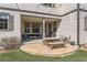Outdoor patio with dining and lounge areas, perfect for entertaining under string lights at 2702 Rising Moon Way, Castle Rock, CO 80109