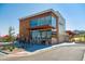 Modern community clubhouse with large windows, bike racks, and inviting outdoor spaces at 2702 Rising Moon Way, Castle Rock, CO 80109
