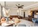 Open concept living room flows seamlessly into the kitchen and dining area at 2702 Rising Moon Way, Castle Rock, CO 80109