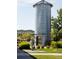 Unique water tower feature surrounded by landscaping and community green space at 2702 Rising Moon Way, Castle Rock, CO 80109